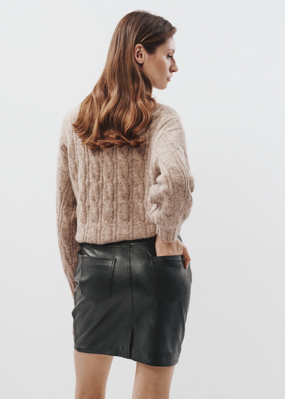 Чорна шкіряна міні-спідниця SPCDS-0069-1276(Z23) | OCHNIK