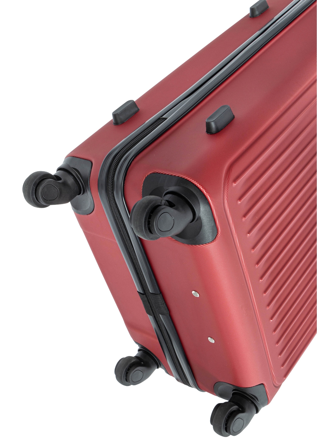 Середня валіза на колесах WALAB-0082-4B-24(W26), крупний план колес виробу на білому фоні.