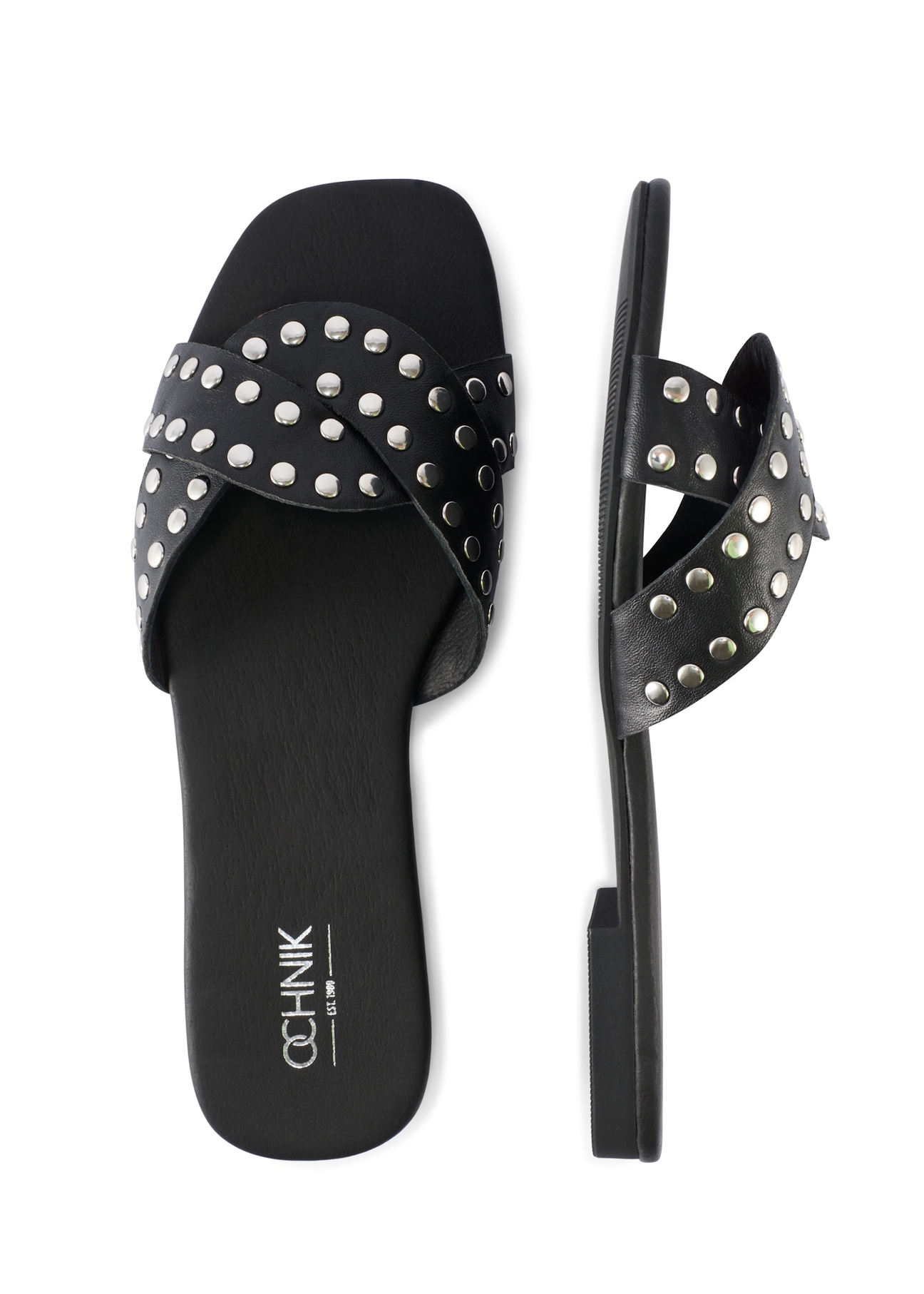 Жіночі чорні шкіряні мюлі зі стразами BUTYD-1226-99(W26), вигляд виробу зверху на білому фоні.