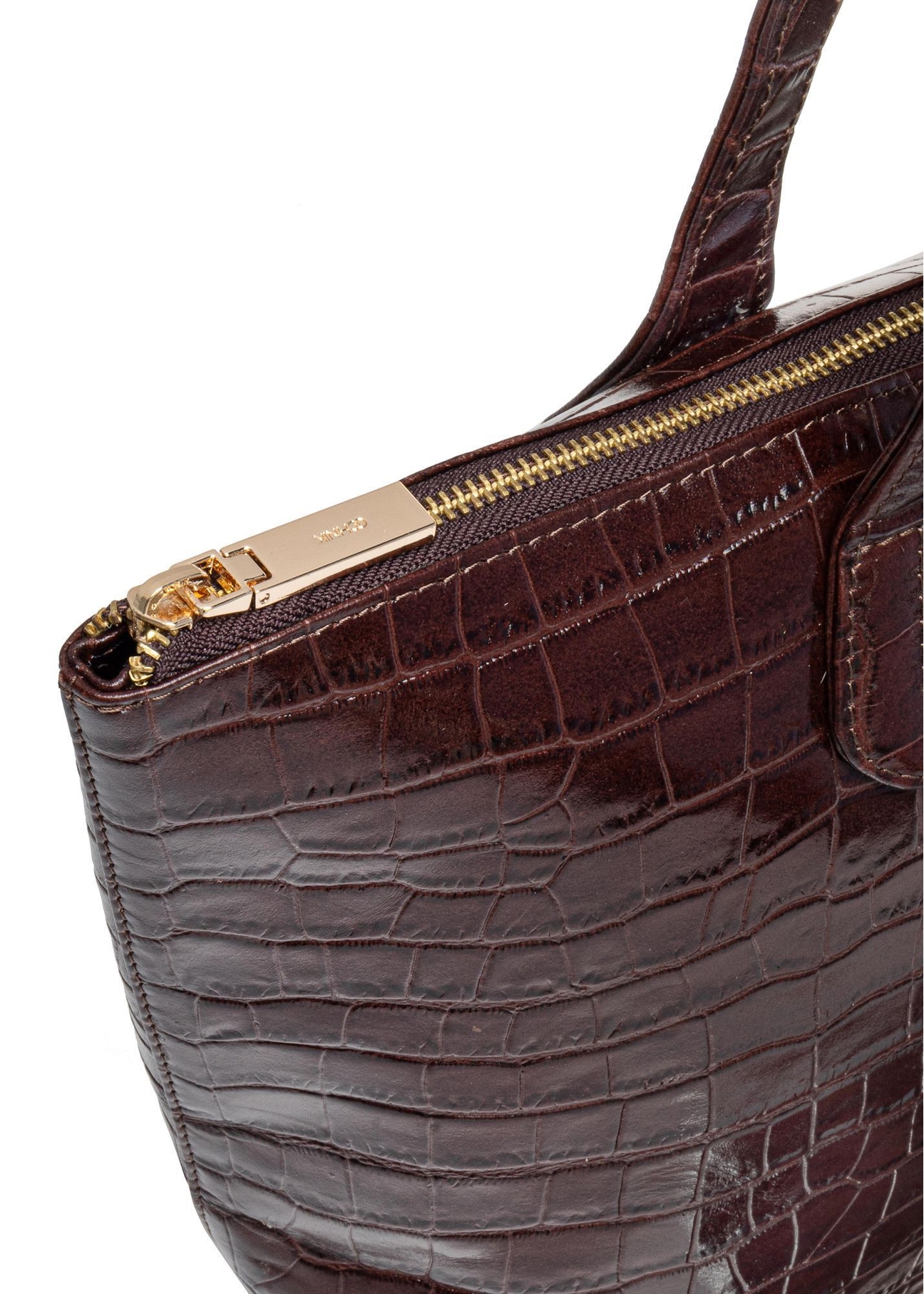 Жіноча коричнева шкіряна сумка-шопер TORES-0939F-1H(W26), крупний план деталі виробу на білому фоні.