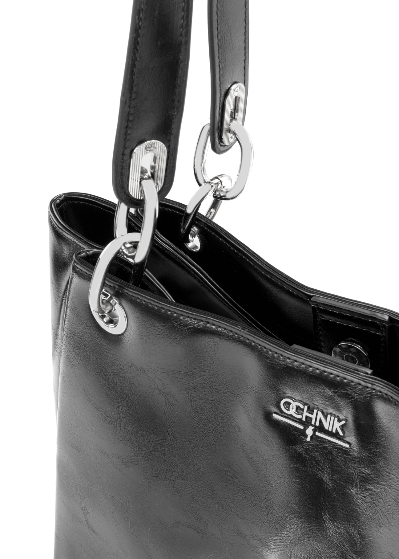 Чорна велика жіноча сумка TOREC-0998-9F(W26), крупний план деталі виробу на білому фоні.