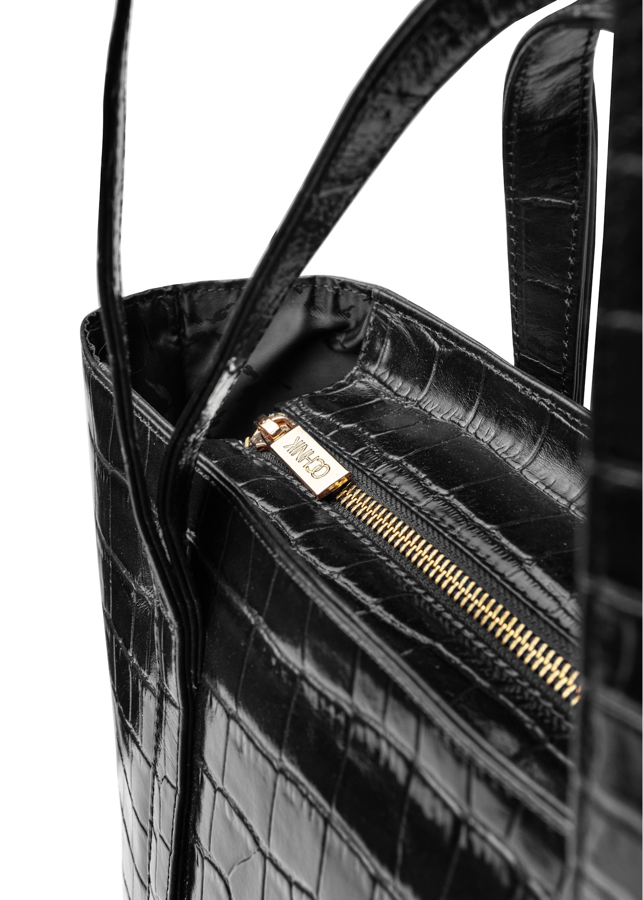 Велика жіноча сумка TORES-1232-9G(W26) зі шкіри кроко, крупний план деталі виробу на білому фоні.