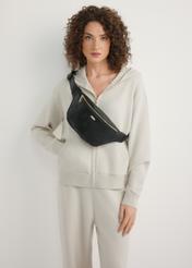 Чорна жіноча поясна сумка з монограмою TOREC-1158-9P(W26), вигляд виробу спереду на силуеті моделі.