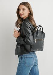 Чорний жіночий рюкзак зі штучної шкіри TOREC-1129-99(W26), вигляд виробу на плечі моделі. Видно половину силуету.