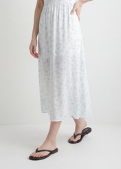 Жіночі темно-коричневі шкіряні шльопанці BUTYD-1271-1I(W26), вигляд виробу збоку на ногах моделі.