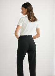 Кремова жіноча футболка з логотипом TSHDT-0155-0B(W26), вигляд виробу ззаду на моделі. Видно половину силуету.