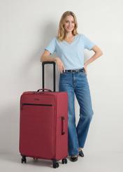 Велика валіза на колесах WALNY-0045-4B-28(W26), діагональний вигляд виробу поруч із силуетом моделі.