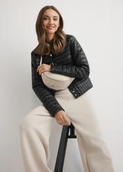 Шкіряна жіноча поясна сумка кремового кольору TORES-0894E-0B(W26), вигляд виробу спереду на силуеті моделі.