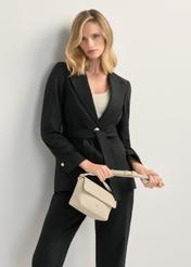 Кремова маленька жіноча сумка через плече TOREC-0916-0B(W26), вигляд виробу по силуету моделі.