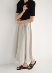 Жіночі шкіряні шльопанці чорного кольору BUTYD-1268-99(W26), вигляд виробу збоку на ногах моделі.