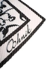 Бежева жіноча хустка з чорними візерунками SZADT-0172-1P(W26), крупний план деталі виробу на білому фоні.