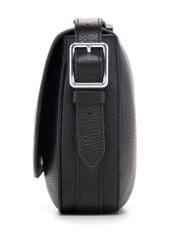 Чорна шкіряна жіноча сумка через плече TORES-1218-9I(W26), вигляд виробу збоку на білому тлі.