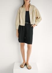 Жіночі золотисті шкіряні шльопанці BUTYD-1157-2X(W26), вигляд виробу спереду на ногах моделі.