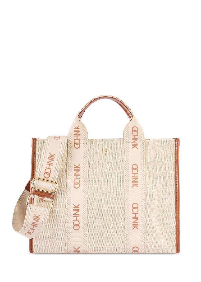 Бежева жіноча сумка-тоут TOREN-0288A-1E(W26), вигляд виробу спереду на білому тлі.